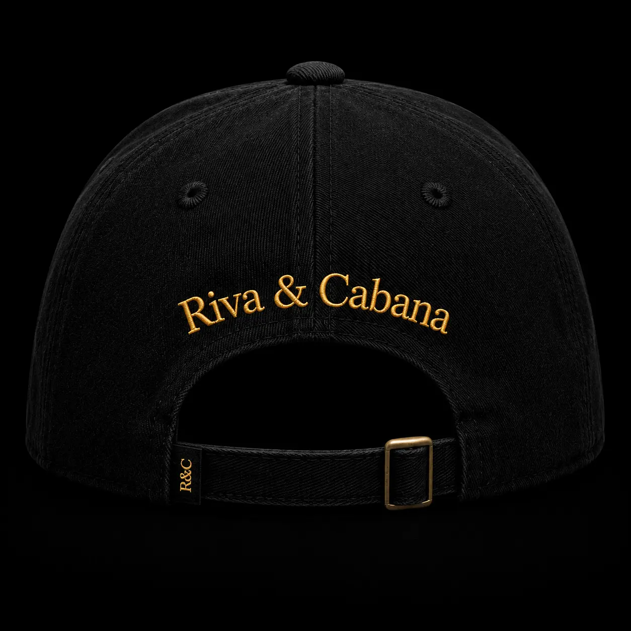 Back of the black Heaven cap with gold Riva & Cabana embroidery